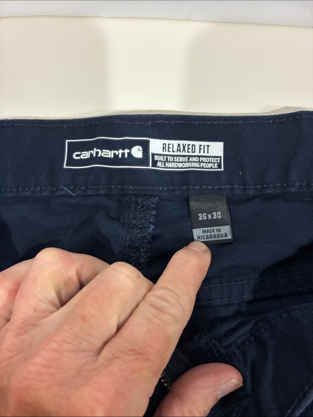 Carhartt Navy Relaxed Fit Work Pants Waist Tag Detail